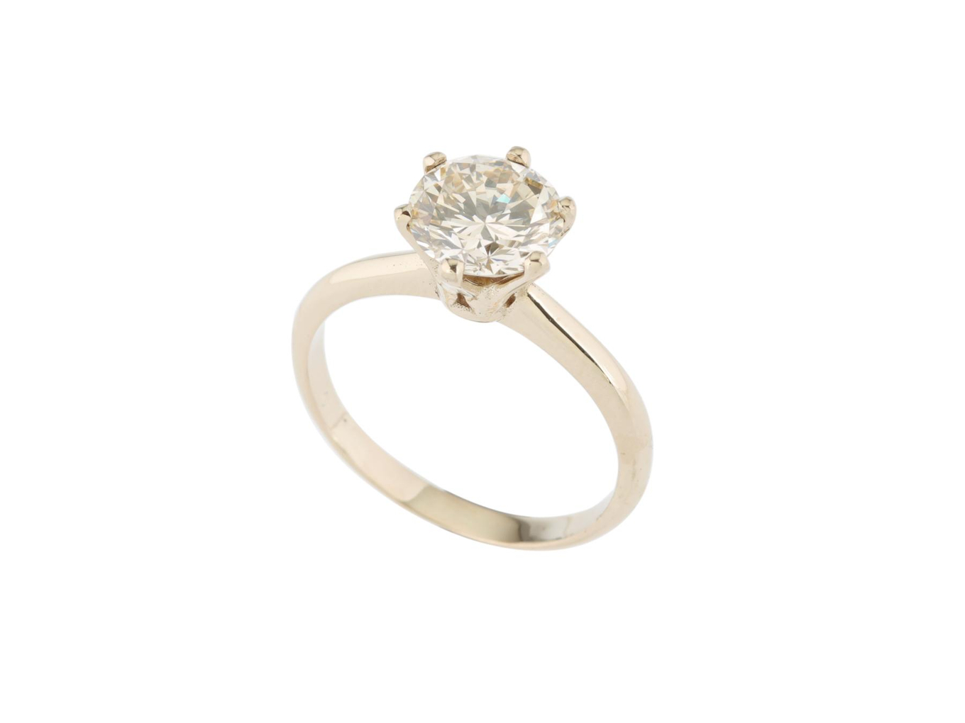Foto de Anel solitário de ouro champanhe 18k e diamante lapidação brilhante regulando 1,74ct (cor O/P, pureza VS). Cerca de 3,0g. Medida 17.