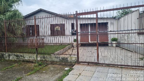Foto de Casa em leilão no bairro Cohab B em Gravataí - RS