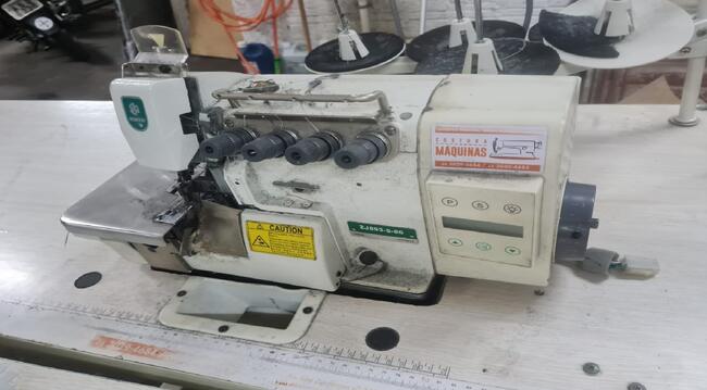 Foto de 01 máquina de costura interlock, marca Zoje