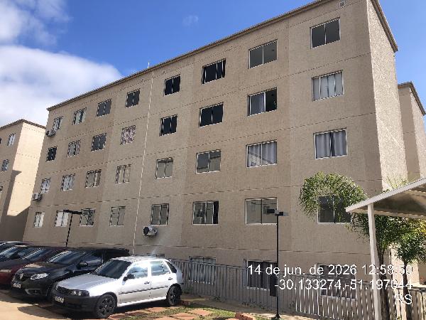 Foto de Apartamento em leilão no bairro Vila Nova em Porto Alegre - RS