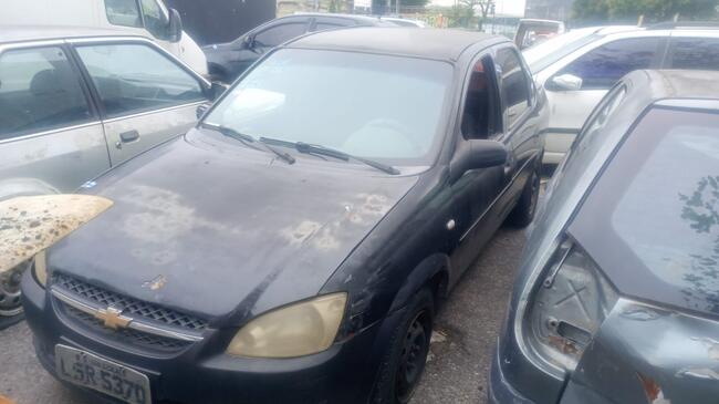 Foto de Chevrolet/Classic Ls | LSR5370/RJ | 2013/2014 | Chassi: 9BGSU19F0EC102671 | Renavam: 564648396 | Motor: NAA325904 | Preta | Gas/Alc/Gn | Veículo Conservado. Faltando Banco Do Carona