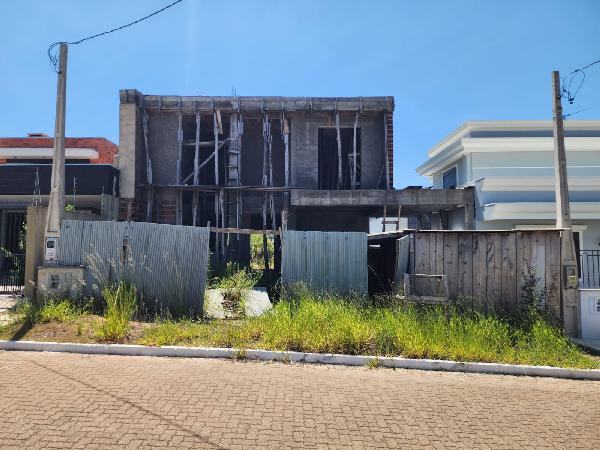 Foto de Casa em leilão no bairro Dom Feliciano em Gravataí - RS