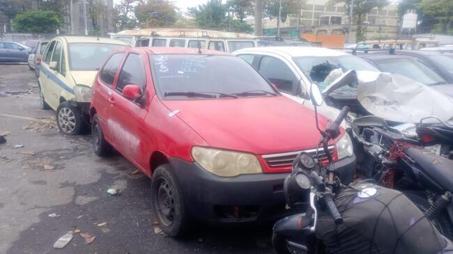 Foto de Fiat/Palio Fire | LRS4656/RJ | 2014/2015 | Chassi: 9BD17102LF7504604 | Renavam: 1031912611 | Motor: 310A10112310708 | Vermelha | Alco/Gasol | Veículo Conservado