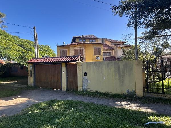 Foto de Casa em leilão no bairro Cavalhada em Porto Alegre - RS