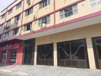 Foto de Apartamento em leilão no Edifício Presidente Costa e Silva em Praia Grande - SP