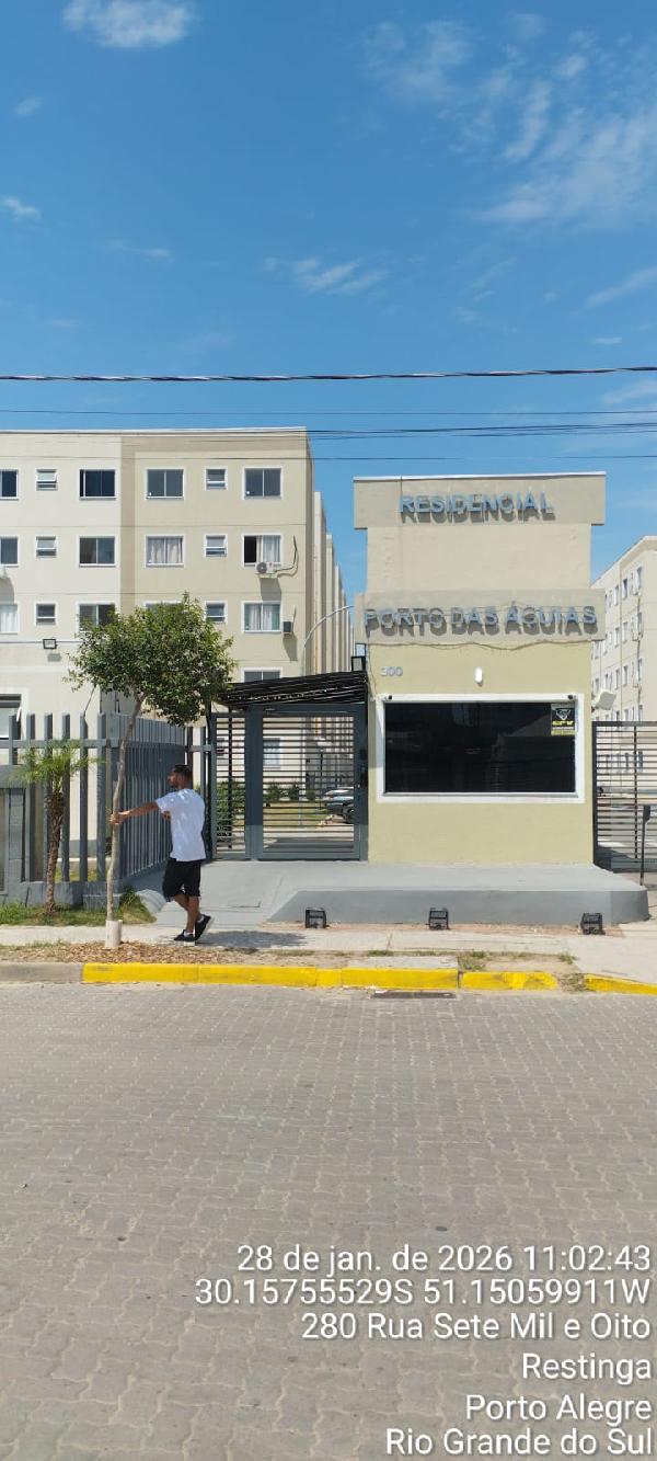 Foto de Apartamento em leilão no bairro Restinga em Porto Alegre - RS