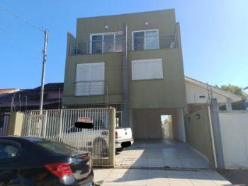Foto de Casa em leilão no bairro Jardim Algarve em Alvorada - RS